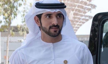 Sheikh Hamdan shares his twins posing with huge balloons at their father's 40th birthday.