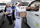 Dubai Police and UAE Food Bank distribute thousands of iftar meals to workers in Al Quoz